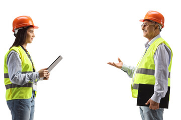 Male and female engineer having a conversation