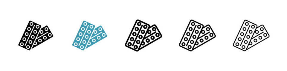 Pill blister pack icons in black and blue set