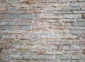 An old brick wall. Texture of light colored brickwork.