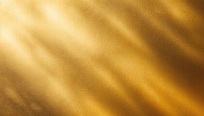 a ray of golden light on textured background creating abstract effect. The light streams diagonally across the surface, casting soft shadows and highlights