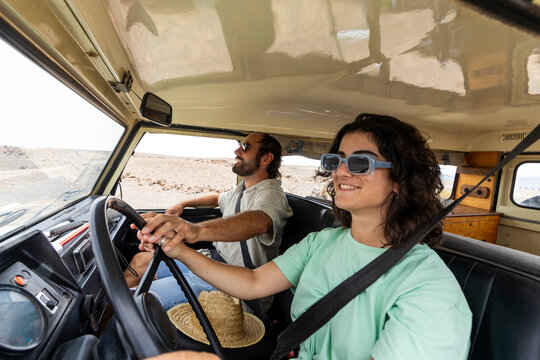 Blind Man and Woman Driving Together in a Motorhome