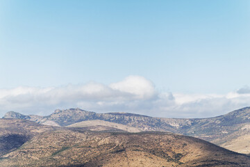 Vast mountain landscape under a clear blue sky during the day
