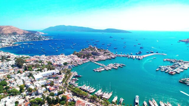 Bodrum District of Mugla, Turkey. Aerial view of Bodrum Castle. Panoramic view of Bodrum center, marina and castle. Drone shot.