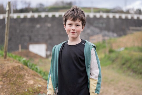 Young boy enjoying a day outdoors in casual attire in bike day