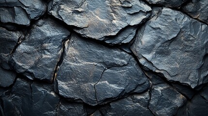 Dark Grey Stone Texture: A Close-Up View of Rough, Irregular Rock Formations