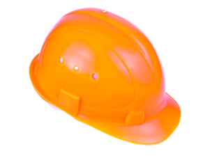 Orange helmet of a construction worker. Isolated without background in png format. Orange protective helmet. Construction industry. Protective headgear of a worker.
