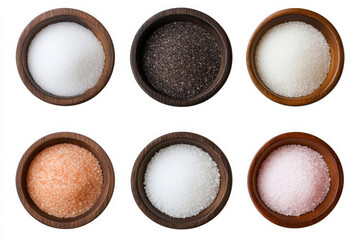 Variety of salts displayed in wooden bowls for culinary use and flavor enhancement in a kitchen setting