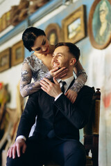 Young couple together on their wedding anniversary at the theatre photoshoot