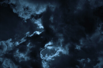 Thunderstorm rain dark blue dramatic sky. Rainy season. Scary scenic background. Moody weather climate. Pollution, carbon dioxide, environmental concept.