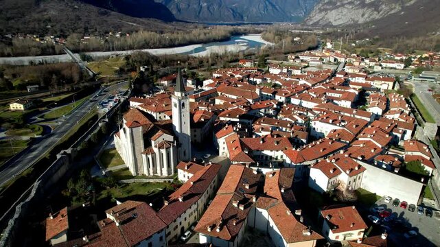 Italy travel and landmarks. Most beautiful medieval villages (borgo) in Friuli venezia Giulia region - Venzone. high angle aerial view. 4k hd video
