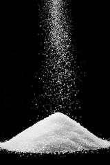 White Sugar Cascading onto a Heap Against a Dark Backdrop - An Exploration of Simplicity and Texture in Culinary Art