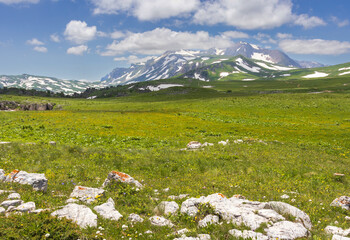 the beginning of the spring period in mountainous areas, remnants of snow cover and panoramic views...