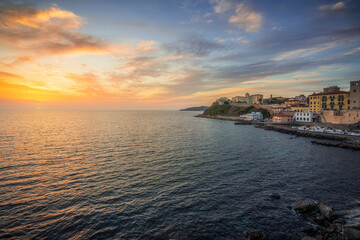 Sunset over the Piombino seafront. Tuscany, Italy