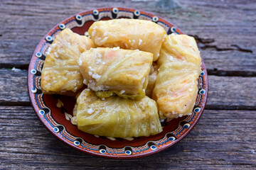 Cabbage rolls with meat, rice and vegetables. Stuffed cabbage leaves with  ground beef. Known as sarma, golubtsy, dolma.
