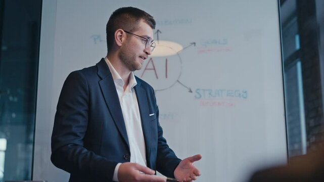 Confident business professional presenting in a modern office setting with AI concepts on a whiteboard. Concept of leadership, innovation, and technology in workplace communication