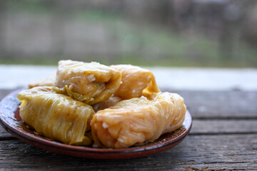 Cabbage rolls with meat, rice and vegetables. Stuffed cabbage leaves with  ground beef. Known as sarma, golubtsy, dolma.