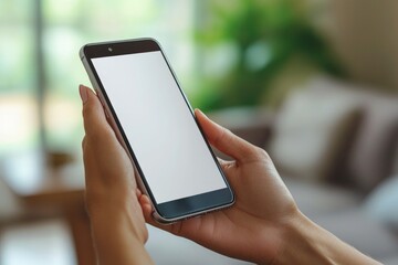 A person holds a smartphone in their hand, possibly checking notifications or taking a photo