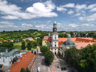 Obraz premium Summer panoramic aerial view of Sanctuary of St. Jadwiga, also known as Trzebnica Abbey (Bazylika i sanktuarium św. Jadwigi w Trzebnicy) in Trzebnica, Dolny Śląsk