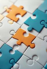 Puzzle pieces fitting together, symbolizing teamwork and strategy