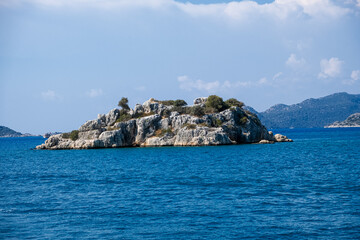 Beautiful bay near Kekova island and Kas in Antalya province, Türkiye. Sunny summer in seaside. Turquoise water
