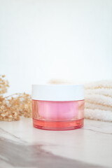 Composition with a monstruizer on white background. Skincare product concept. Copy space.