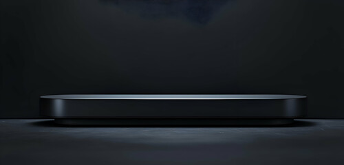 A sleek black podium with a long platform, standing in front of a dark backdrop to enhance product presentation.