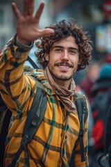 A cheerful man greeting with a smile in a bustling urban setting.