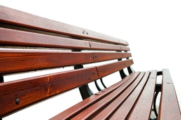 Fototapeta premium A close-up shot of a wooden bench sitting on a plain white background