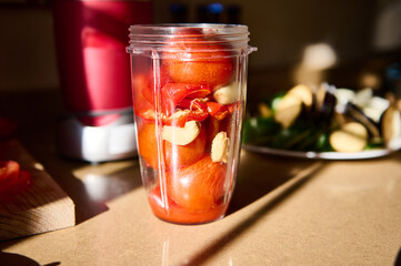 Fresh ingredients in a blender jar prepared for homemade recipe creation