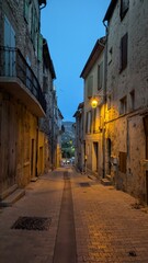 Fototapeta premium A street in a small town in the south of France at night street in the town.