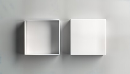 Fototapeta premium Top view of two blank white rectangular boxes on gray background. One box open, closed. Simple design. Ideal for product packaging mockups, branding, presentation, design templates, online retail.