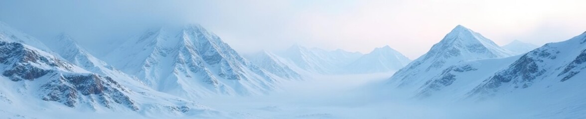 Obraz premium Snow-covered mountains with a misty atmosphere and frosty textures, mountains, snowy, misty