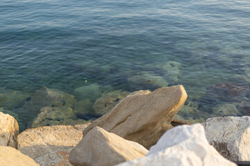 mound of large stones near the sea coast