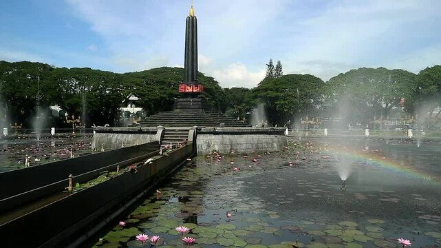 Alun-Alun Tugu is a round square located in front of the City Hall of Malang City, East Java. The square was built in 1920 by the Dutchman Thomas Karsten, surrounded by fountains and lotus ponds. 