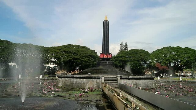 Alun-Alun Tugu is a round square located in front of the City Hall of Malang City, East Java. The square was built in 1920 by the Dutchman Thomas Karsten, surrounded by fountains and lotus ponds. 