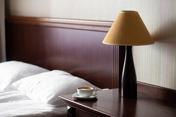 a beautiful photo of the interior of a bedside lamp in a hotel room