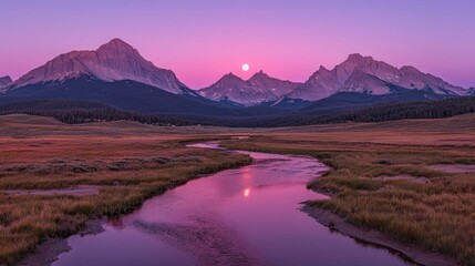 Sunset over river, mountains, Wyoming plains; peaceful landscape, travel