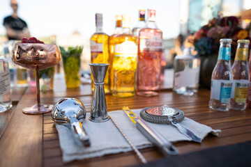 professional accessories on the table for making an alcoholic cocktail by a bartender