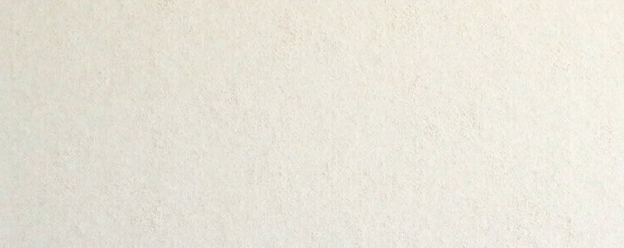 Polished plaster wall in creamy white with subtle texture and color variations, smoothsurface, houseinterior, coloredstucco