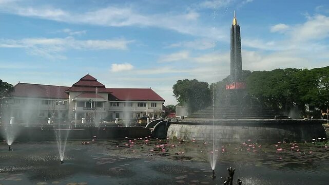 Alun-Alun Tugu is a round square located in front of the City Hall of Malang City, East Java. The square was built in 1920 by the Dutchman Thomas Karsten, surrounded by fountains and lotus ponds. 