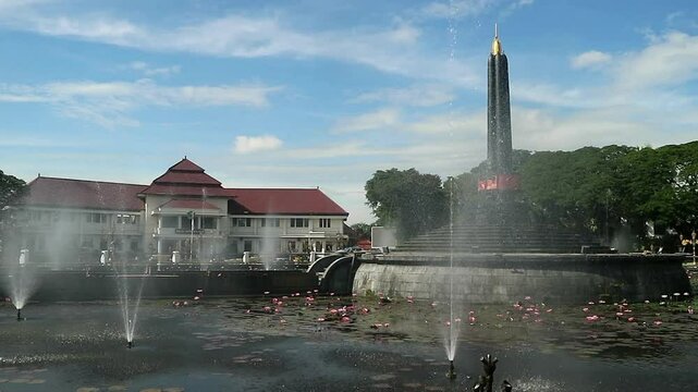Alun-Alun Tugu is a round square located in front of the City Hall of Malang City, East Java. The square was built in 1920 by the Dutchman Thomas Karsten, surrounded by fountains and lotus ponds. 