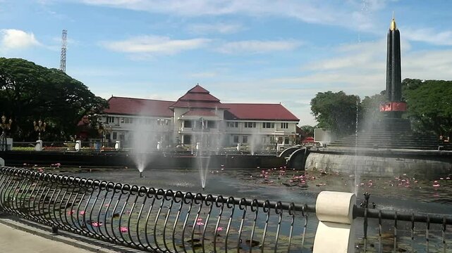Alun-Alun Tugu is a round square located in front of the City Hall of Malang City, East Java. The square was built in 1920 by the Dutchman Thomas Karsten, surrounded by fountains and lotus ponds. 