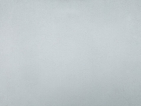 White paint wall texture or background with grainy, textured, gotele, scratched, rough and scratchy effect for typical Mediterranean house, chalet and villa exteriors in Spain.