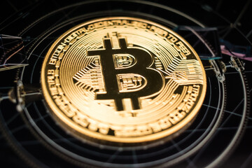 Fototapeta premium Golden Bitcoin Coin on Futuristic Digital Technology Background
