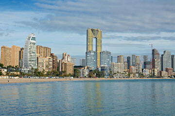 Fototapeta premium Beautiful view to Mediterranean Sea and Benidorm resort city and Poniente beach. Benidorm is a popular coastal resort town in Alicante province, Spain