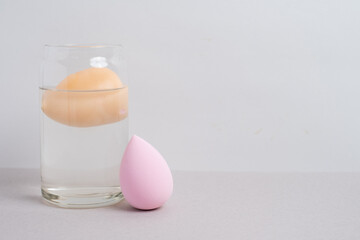 Beauty blender, on a light background. Makeup sponge. Beauty concept
