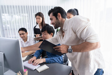 Fototapeta premium Group of diverse office worker employee working together on strategic business marketing planning in corporate office room. Positive teamwork in business workplace concept. Prudent