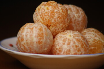 Tangerines without peel close-up