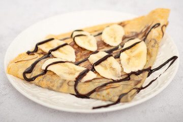 pancakes with chocolate and banana