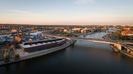 Obraz premium Aerial View of Szczecin, Poland with Bridges and Harbor at Sunset